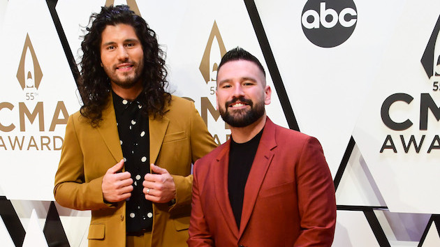 When they’re not on tour, Dan + Shay are “floating around the pool with an acoustic guitar” this summer